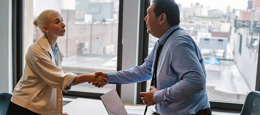 Handshake after successful interview.