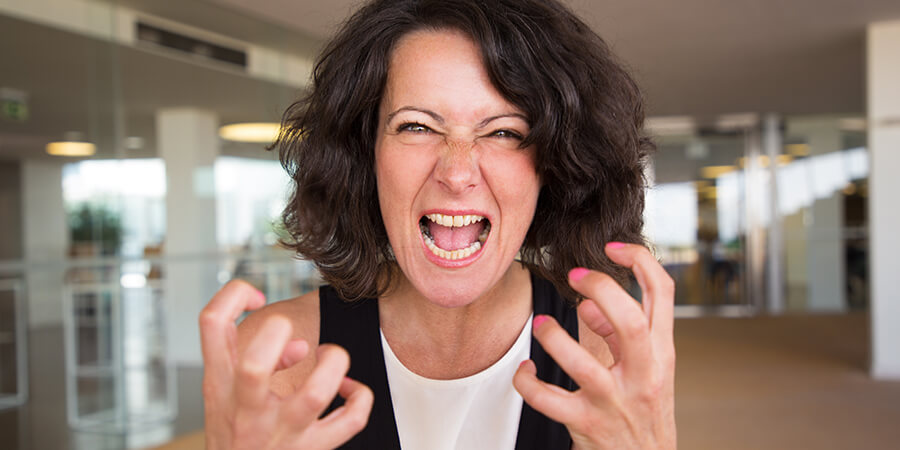 Close up of an angry woman.