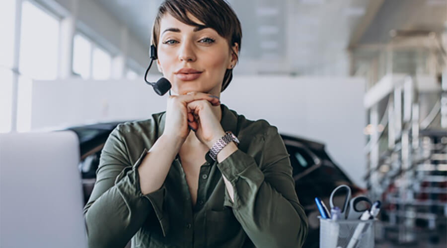 Female call center agent with headset.