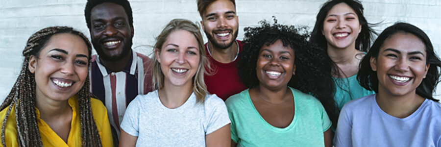 A group of people from various different cultures and ethnic backgrounds.