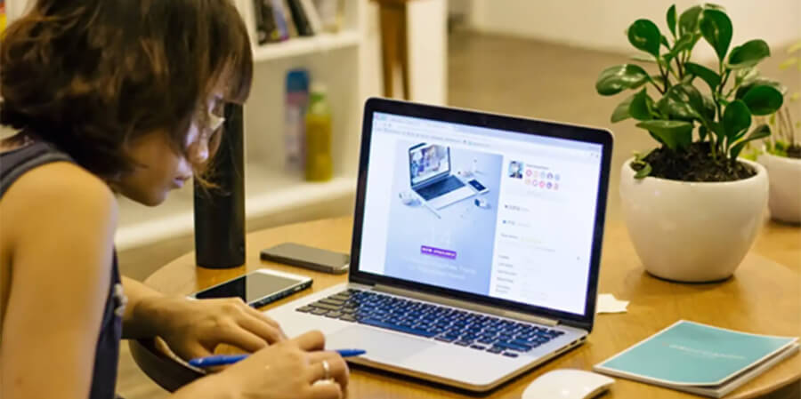 Person working on a laptop.