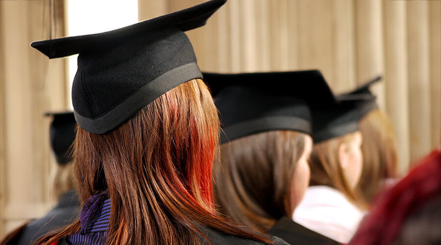 Close up of the back of a graduate's head.