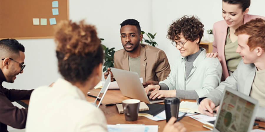 Group of people working in an office.