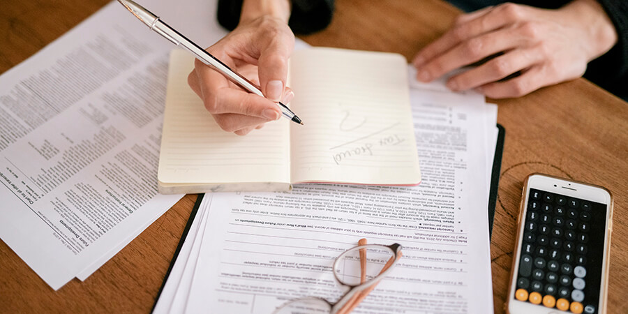 Person doing paperwork.