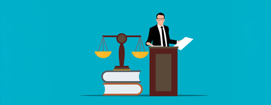 Vector of lawyer standing behind a lecturn with two large books and some scales.