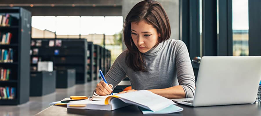 Studying in the library.