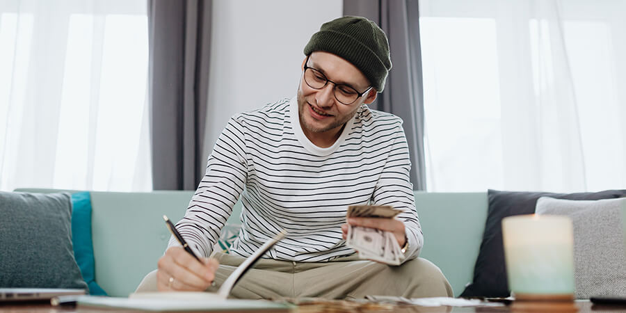 Young businessman with a woollen hat.