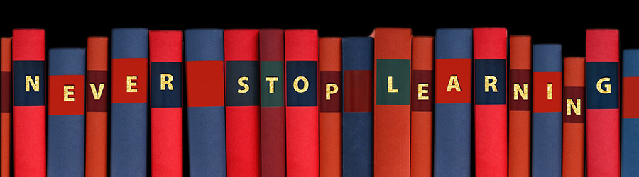 Books spelling 'never stop learning'