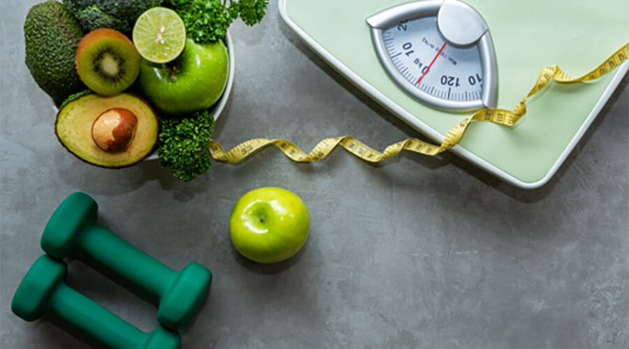 Green scales, green weights and green fruit and vegetables.