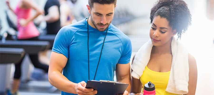 Woman with her personal trainer.