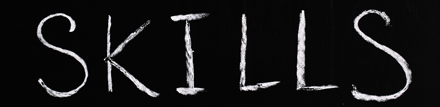 'SKILLS' written in chalk on a blackboard.