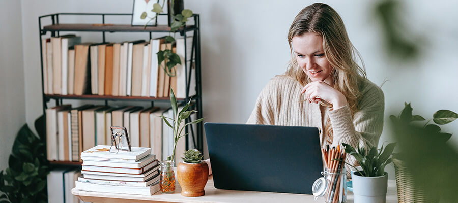 Woman working in home office.