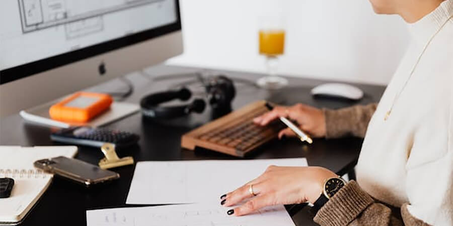 Woman working on a computer.