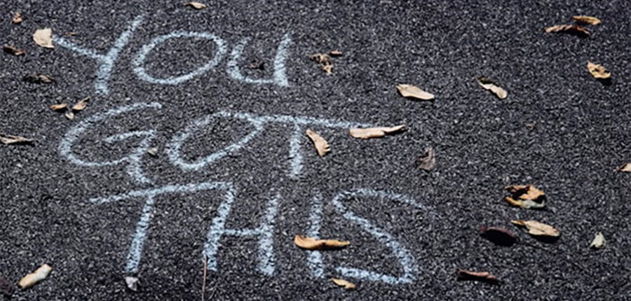 'You Got This' - written in chalk on tarmac.